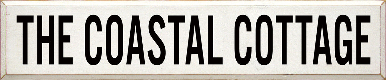 wood coastal cottage sign in white