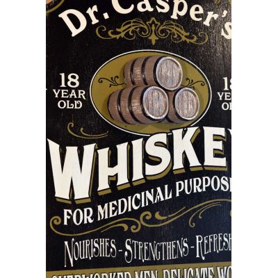 close up of wood sign for 18 year whiskey