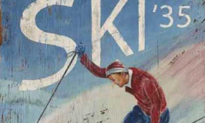 Collection of ski-themed vintage signs