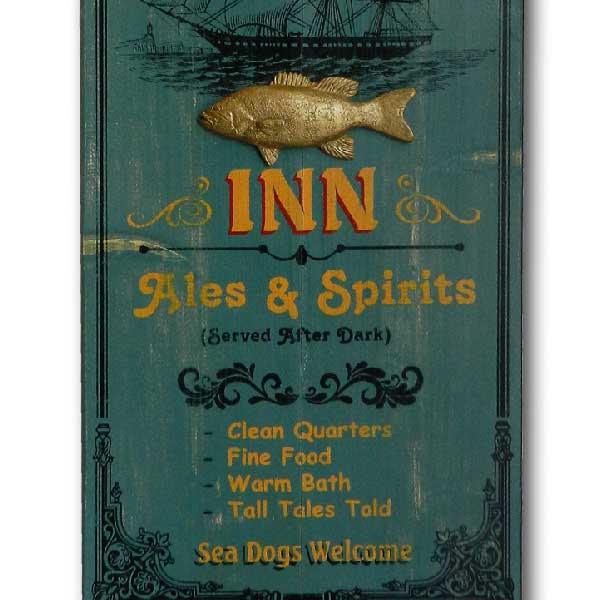 close up of The Old Fisherman's Inn; vintage wood sign with raised fish