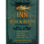 close up of The Old Fisherman's Inn; vintage wood sign with raised fish
