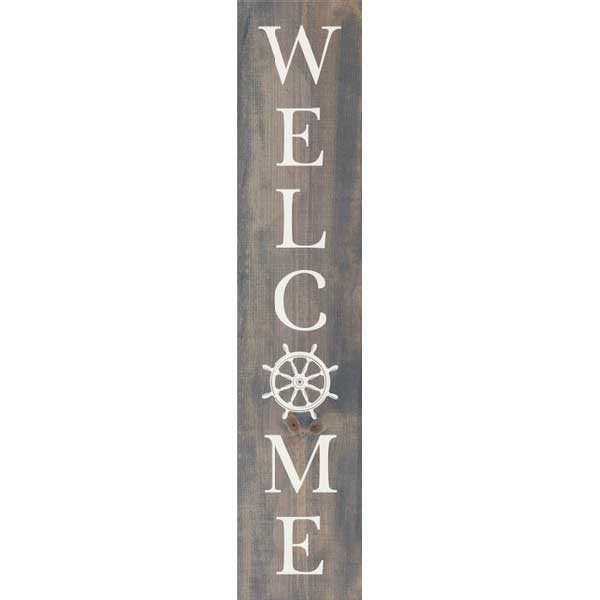 Welcome sign with ship's wheel in weathered gray