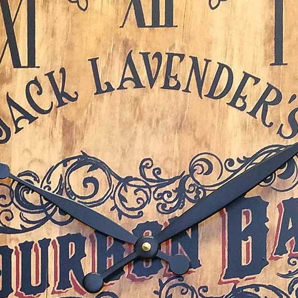 close up of face of wood clock for Bourbon Bar