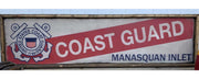 wood sign for US Coast Guard Station