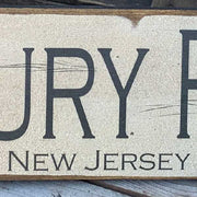 close up of detail on rustic location name sign