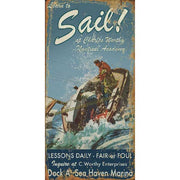 Learn to Sail with image of sailboat in heavy wind; vintage wood sign