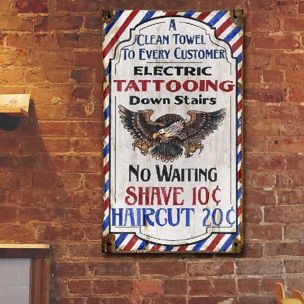 classic ad for a barber shop offering tattoos