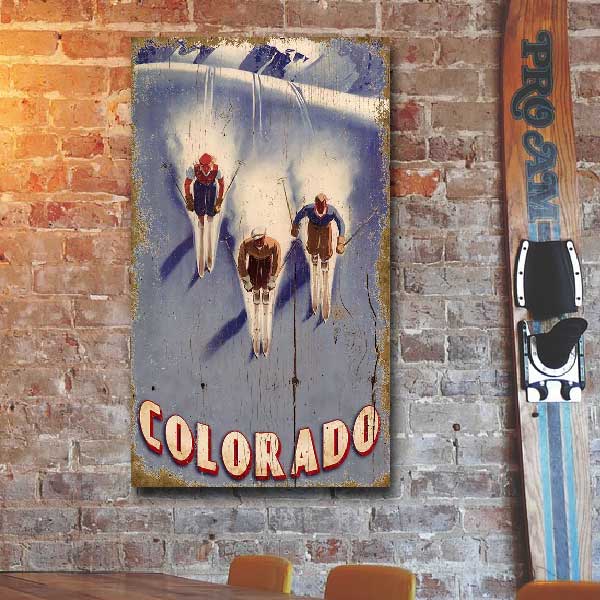 who will win? three skiers racing downhill in Colorado