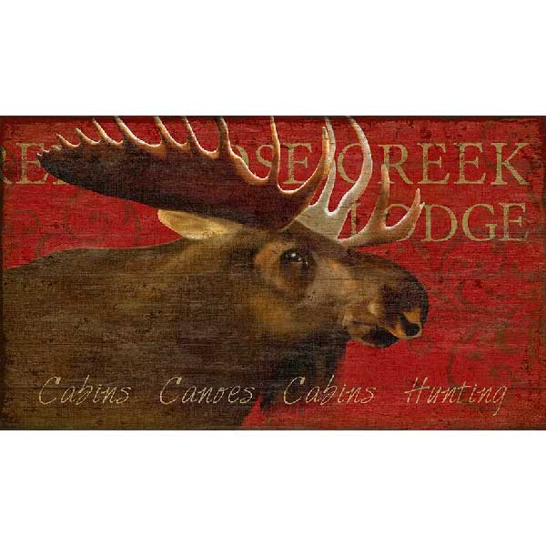 old wood sign for Moose Creek Lodge