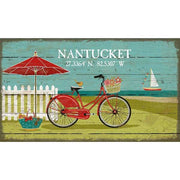 Wood sign art of bike on a Nantucket beach
