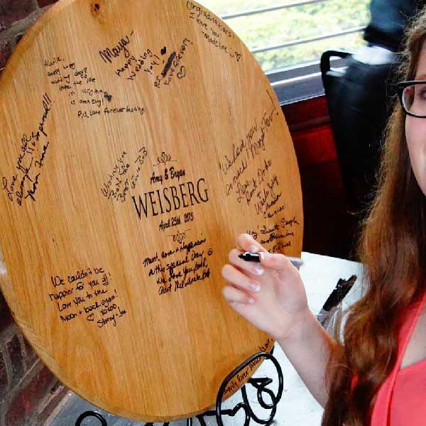 let wedding guests sign names on keepsake
