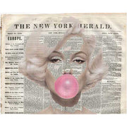 modern art wood sign of newspaper with pink bubblegum