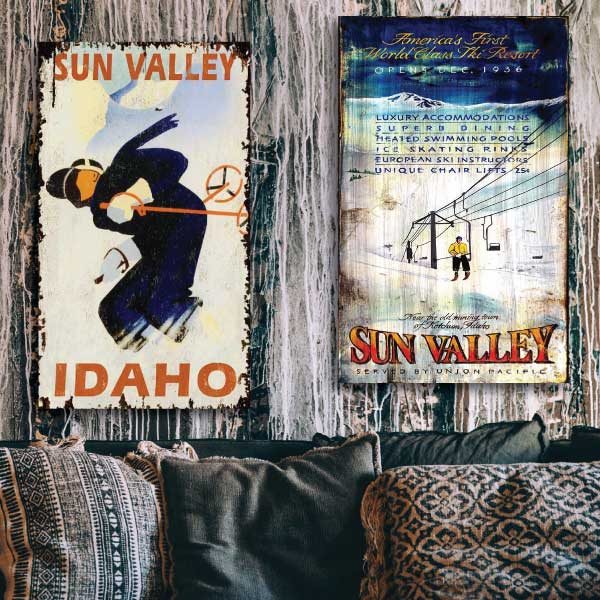 Decor for your Sun Valley condo; two vintage ski signs above a dark couch.
