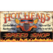 Vintage ad for Hot Heads Speed Shop. Flames along the bottom with the motto You're not Cool if You're not Hot!