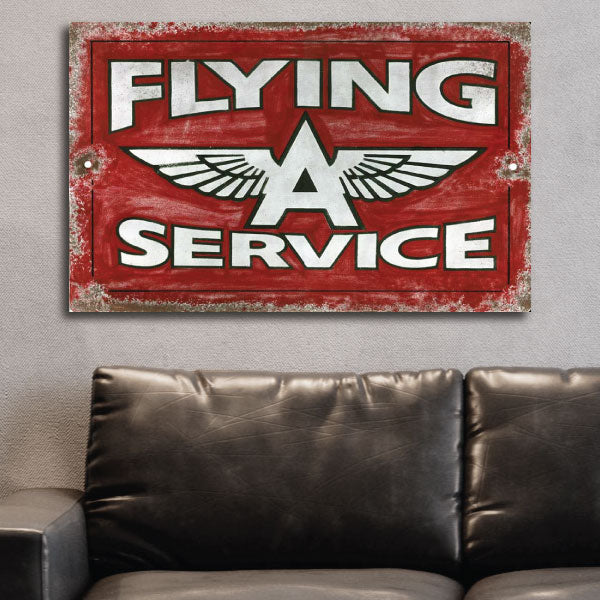 Vintage ad for Flying A Service above a couch