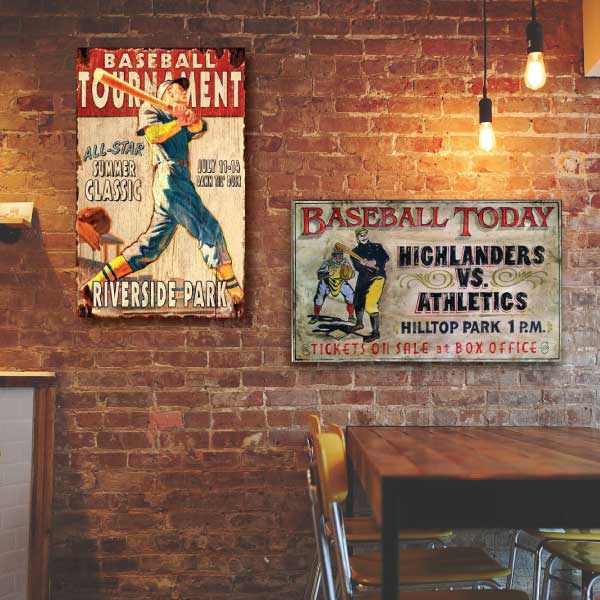sports bar with two vintage baseball signs hanging on a brick wall; best sports bar decor