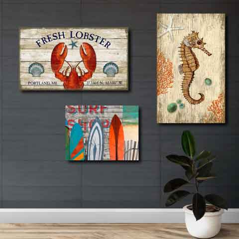 Seahorse, lobster and surf shop wood signs in a living room