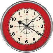 Wall clock with red background and center compass; nautical