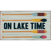 Wood sign with 4 oars and the text "On Lake Time"