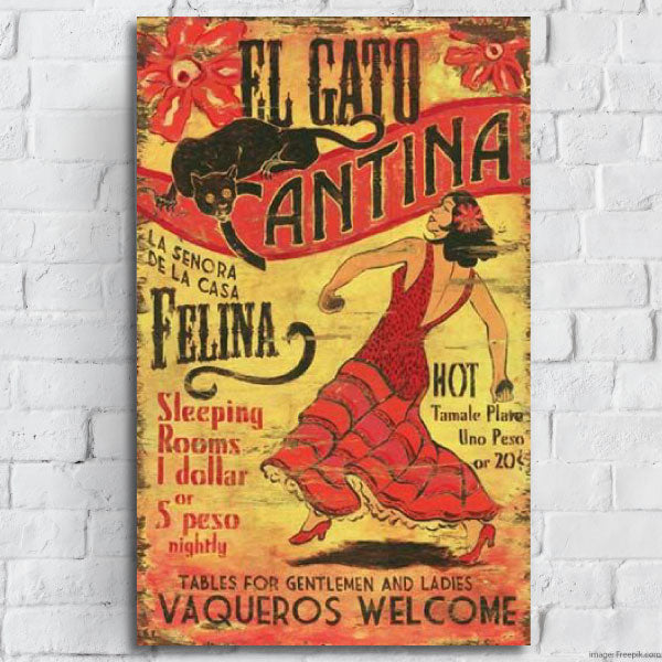 Yellow and red vintage sign for El Gato Cantina with salsa dancer
