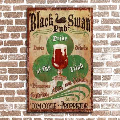 Vintage ad for an Irish Pub - Black Swan on a brick wall