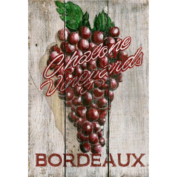 Red Bordeaux grapes with name of vineyard