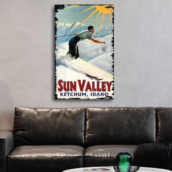 Skiing in Sun Valley on a sunny day; Sun Valley, Ketchum, Idaho; shown displayed above a leather couch