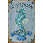 weathered and worn sign for Seahorse Tavern. Blue background with image of a seahorse.