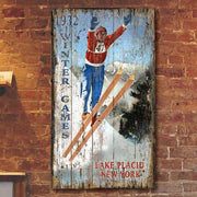 vintage wood sign of a ski jumper at the 1932 Lake Placid winter Olympic games