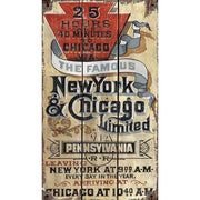 Vintage ad for train from NY to Chicago; weathered wood sign; New York on the Pennsylvania Railroad