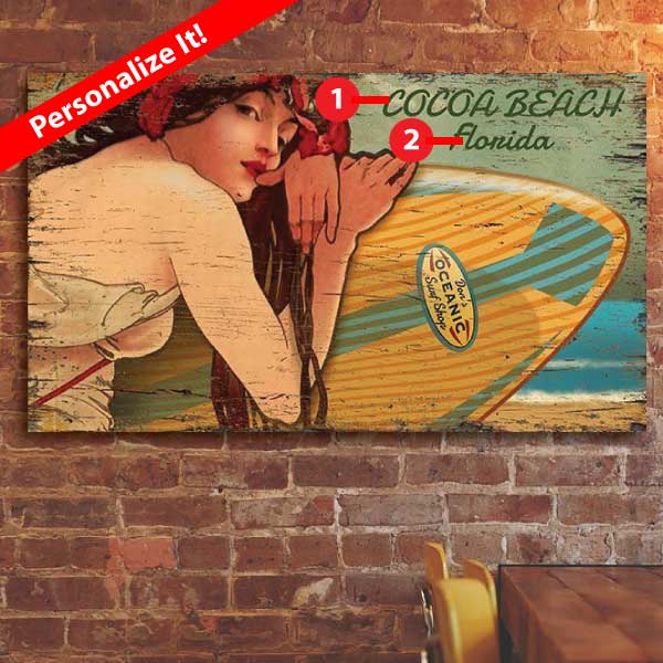 surfer girl with surfboard on a beach; Cocoa Beach, Florida; vintage wood sign against brick wall