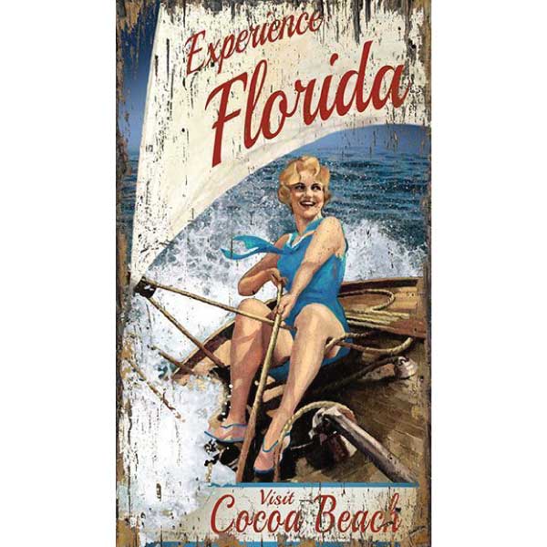 Women sailing a dingy; Experience Florida; Ad for Cocoa Beach