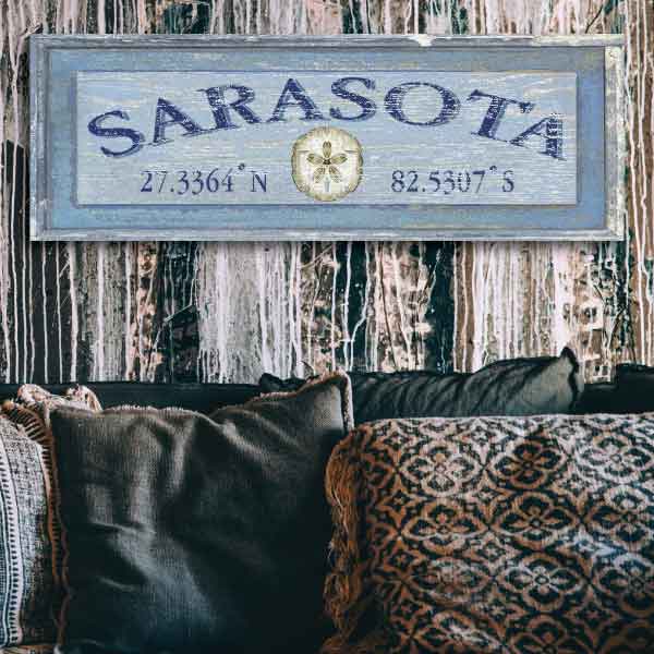 Sarasota town name sign with lat and long