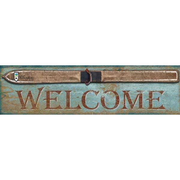 image of an old wood ski with the text "Welcome" below. Ski resort name is on the ski tip