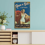 Vintage sign of girl at beach with a ball
