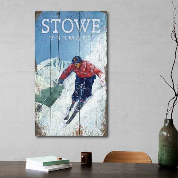 Skier on edge of mountain with text Stowe Vermont