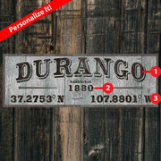 Western town - Durango - antique sign with year established
