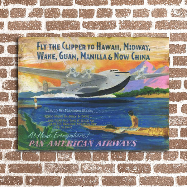 Pan American Flying Clipper landing in Hawaii; wall art on a brick wall