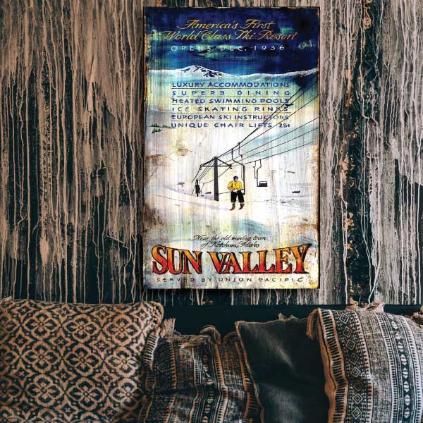 Old ad for America's First Ski Resort, Sun Valley, Idaho. Image shown above a couch.
