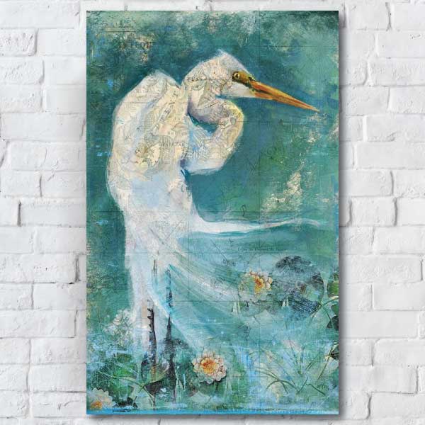large painting of great Egret hung on a white brick wall