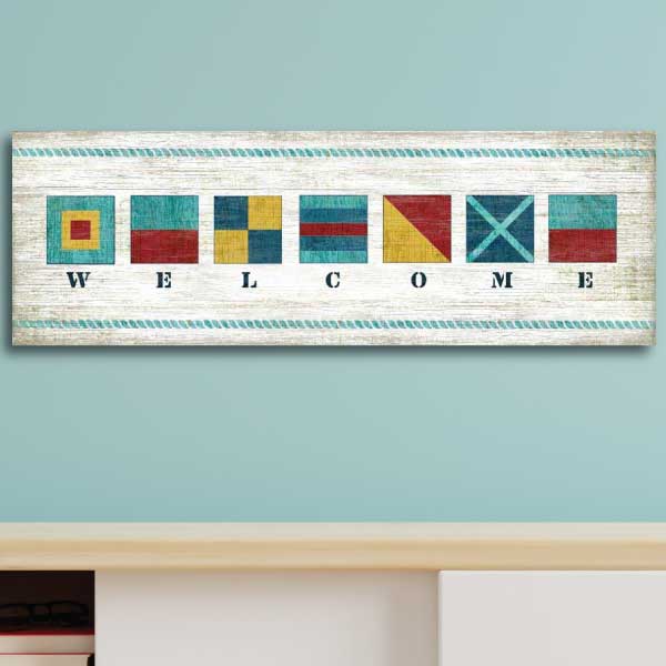 Nautical flags spelling "Welcome"; weathered look