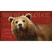 Image of a brown bear with red background. text is Big Bear Lodge, Cabins, Canoes, Fishing. Vintage wood sign
