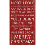 Christmas wood vintage sign with holiday related "subway" stops listed; merry christmas!
